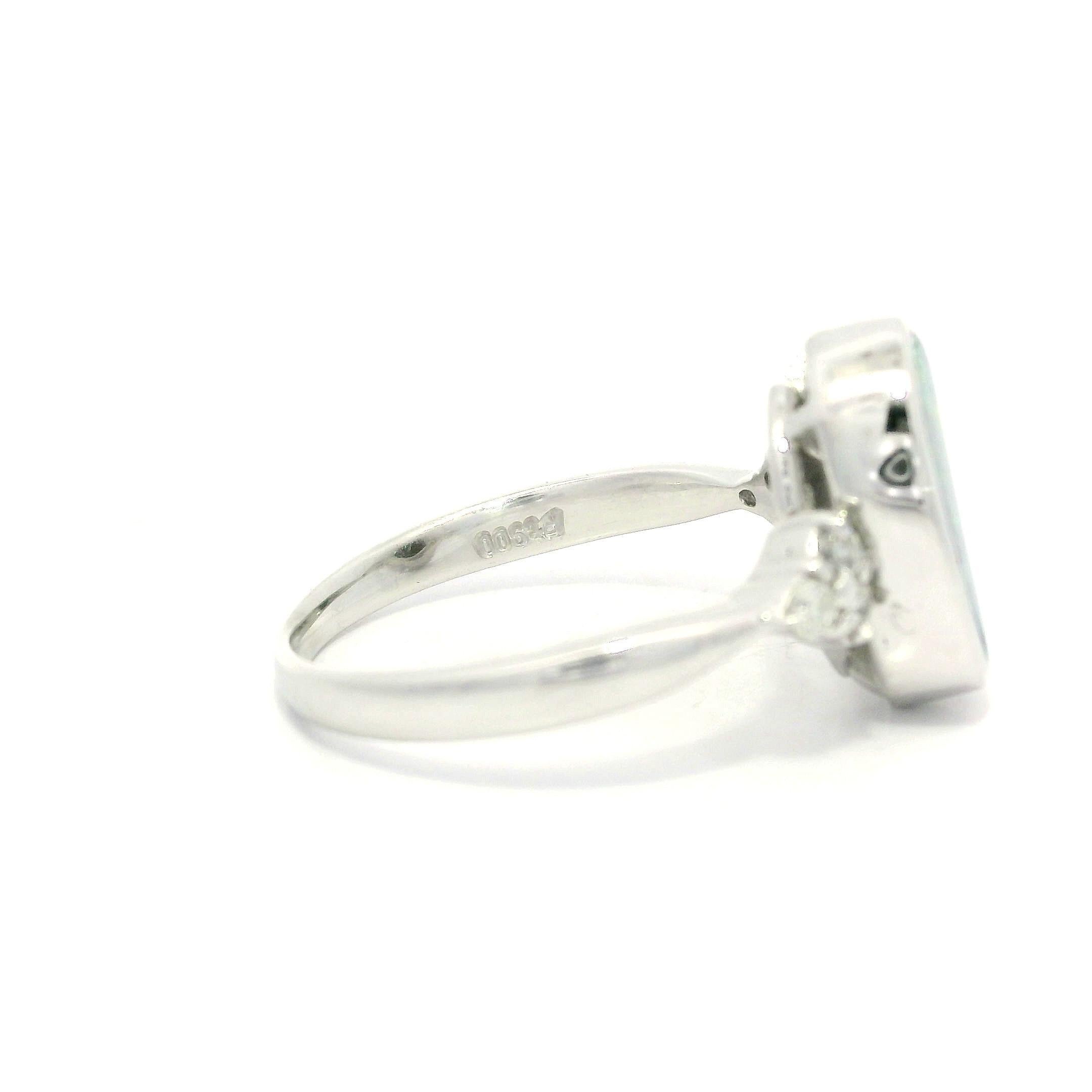 Platinum 2.29ctw Oval Bezel Boulder Opal w/ Diamond Cluster Accents Modern Ring For Sale 1