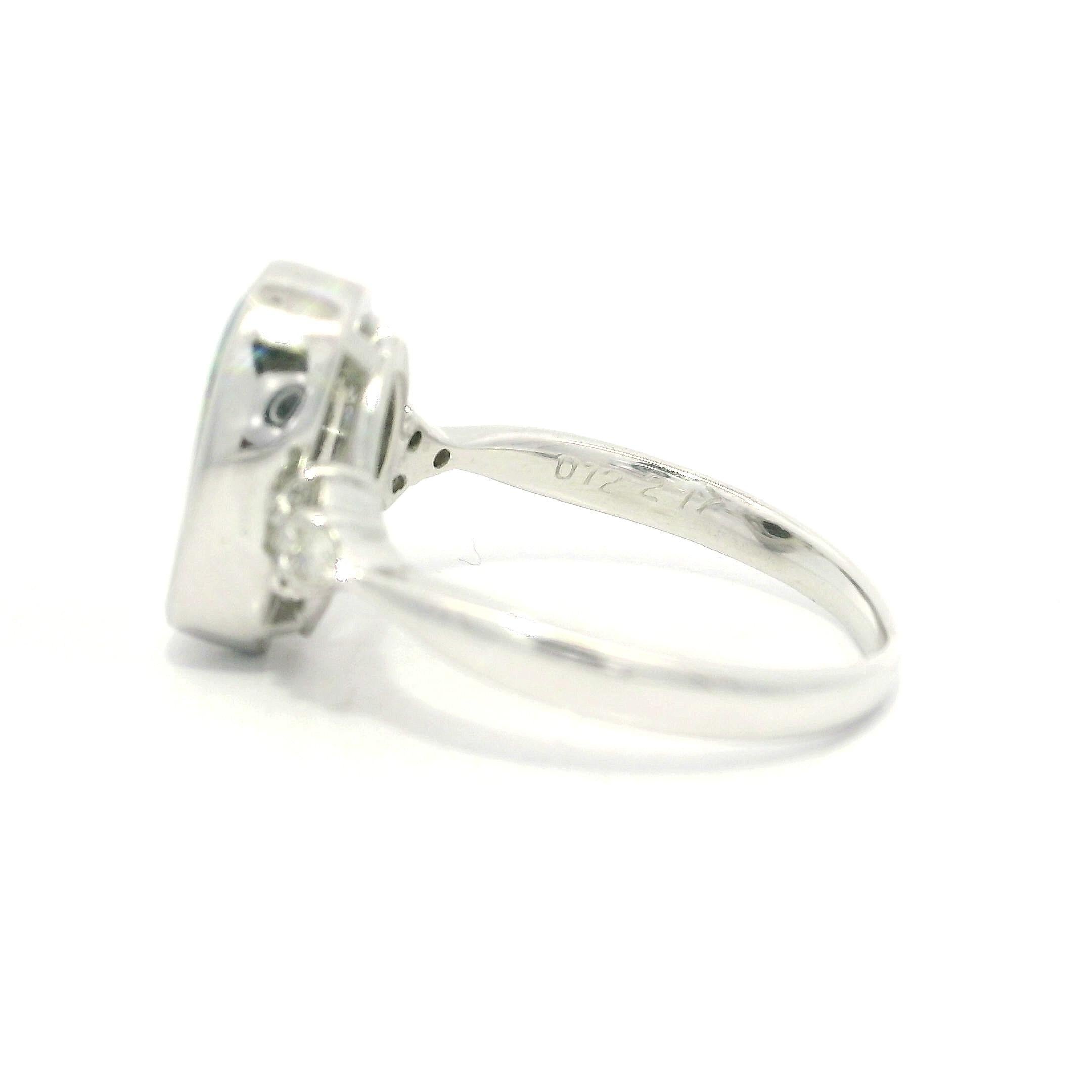Platinum 2.29ctw Oval Bezel Boulder Opal w/ Diamond Cluster Accents Modern Ring For Sale 4