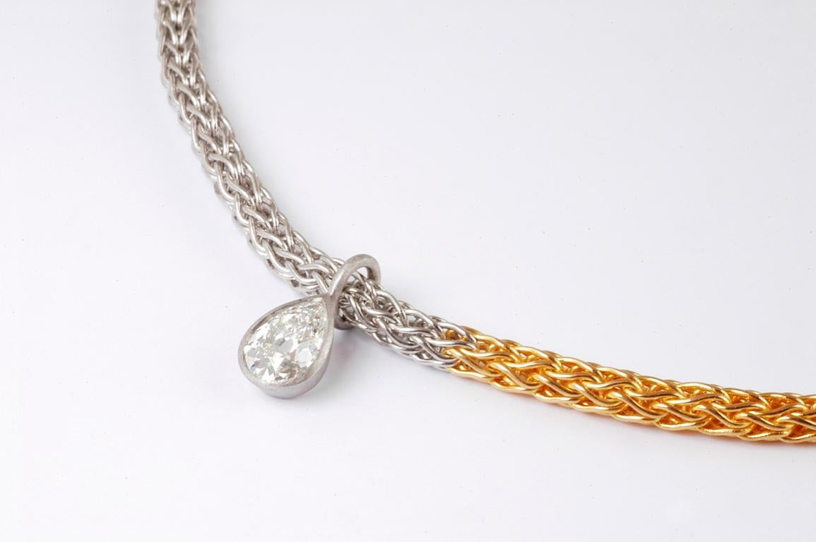 Platinum and 22ct gold hand woven chain with diamond hook with platinum set pear shaped diamond 2.80cts. Handmade in Notting Hill London by renowned British jeweller Malcolm Betts.

This rope chain is an ancient loop technique used since Etruscan