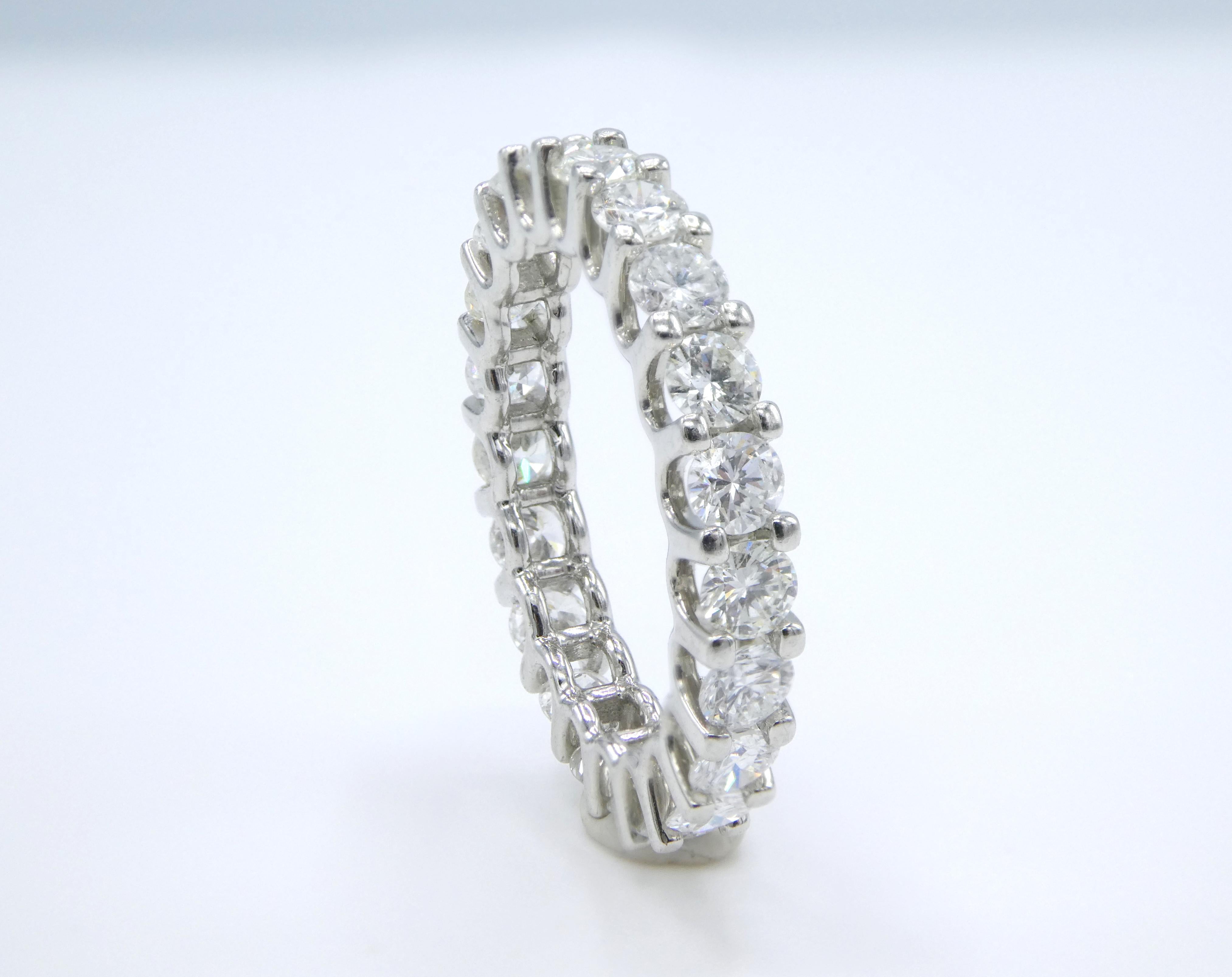 Platinum 2.30 Carat Round Natural Diamond Eternity Wedding Band Ring Size 6

Metal: Platinum
Diamonds: 21 round brilliant cut natural diamonds, approx. 2.30 CTW G VS - SI
Band is 3.1mm wide
Size: 6
Excellent condition
