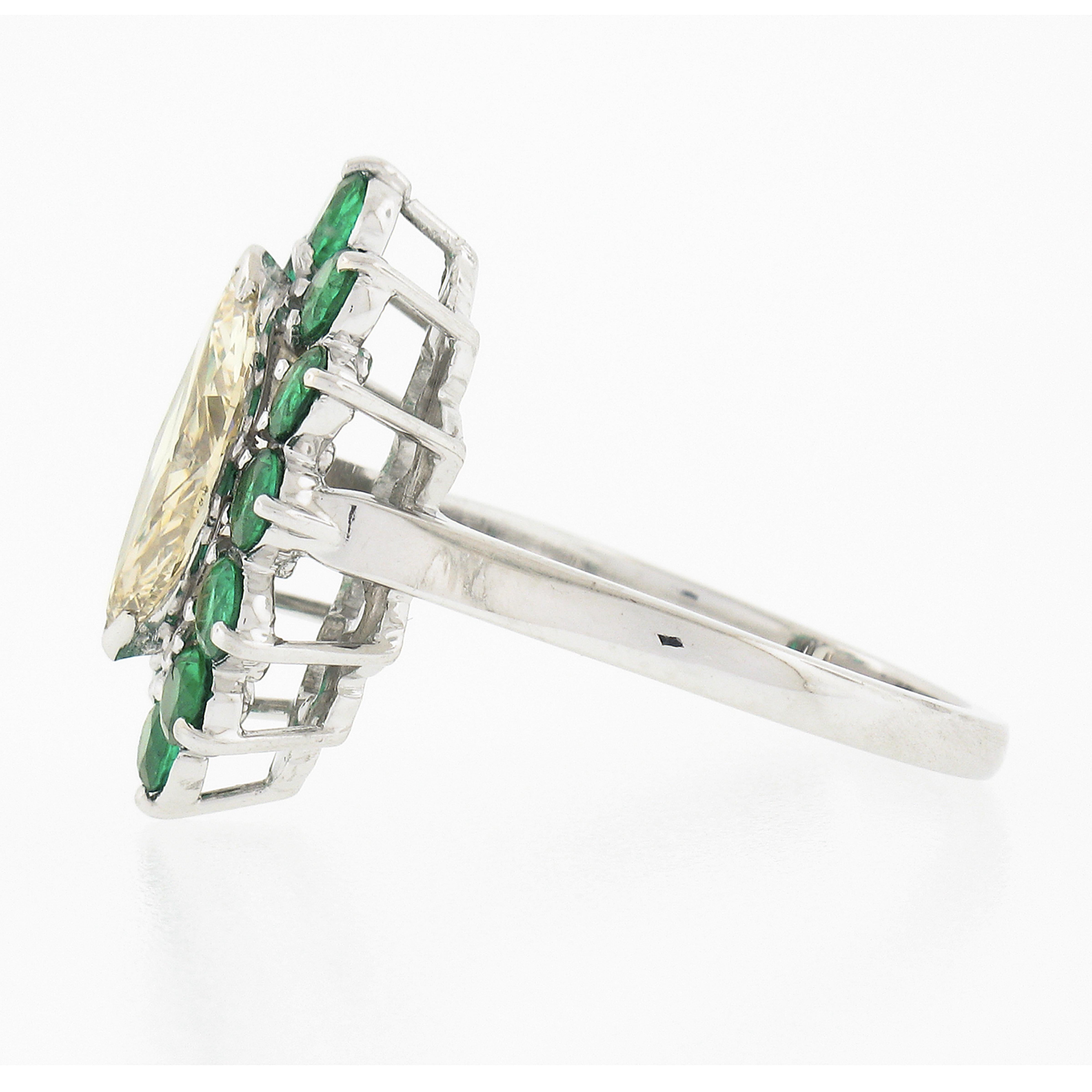 Platinum 2.30ct Marquise Light Yellow Diamond w/ Vivid Round Emerald Halo Ring For Sale 1