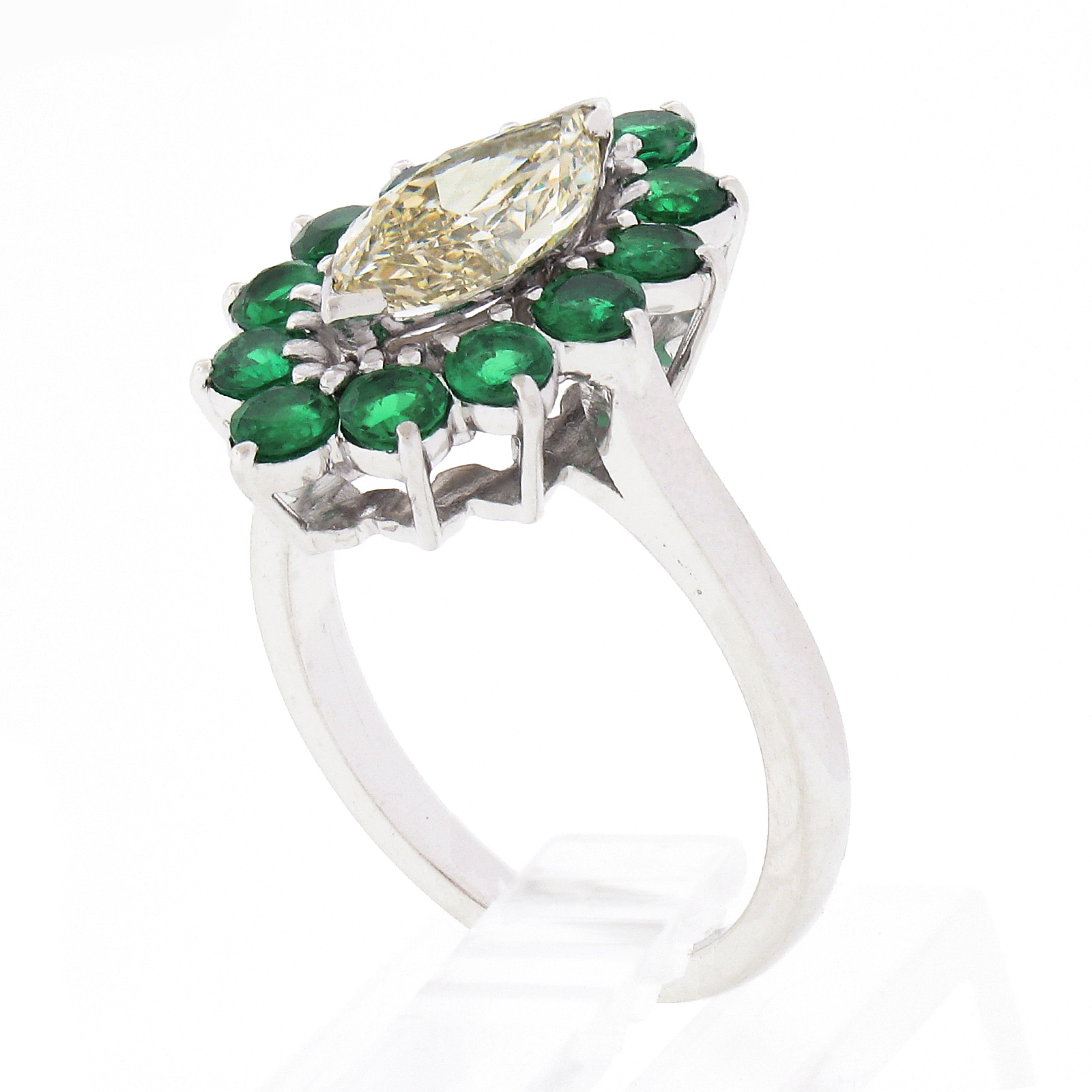 Platinum 2.30ct Marquise Light Yellow Diamond w/ Vivid Round Emerald Halo Ring For Sale 4