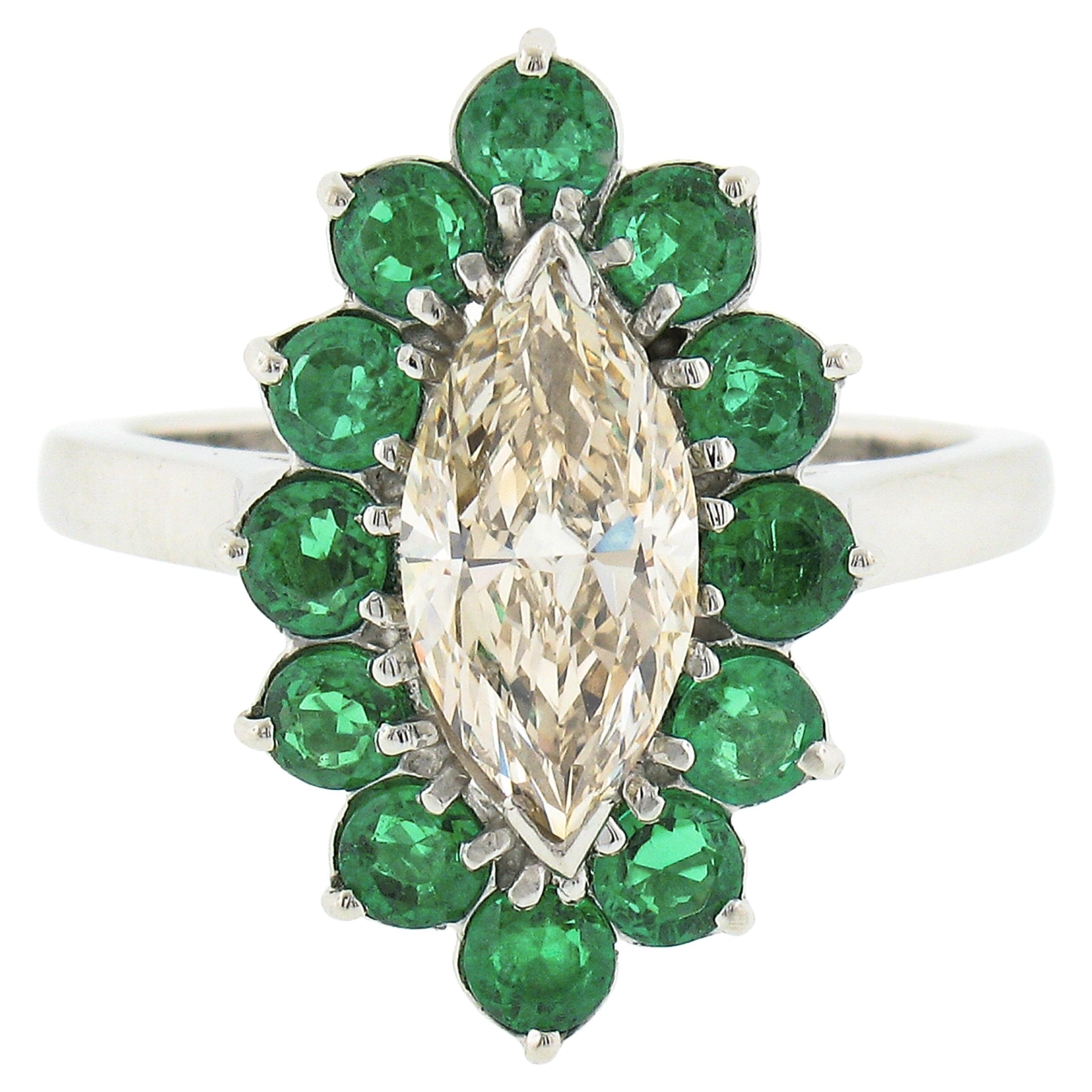 Platinum 2.30ct Marquise Light Yellow Diamond w/ Vivid Round Emerald Halo Ring For Sale