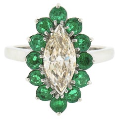 Retro Platinum 2.30ct Marquise Light Yellow Diamond w/ Vivid Round Emerald Halo Ring