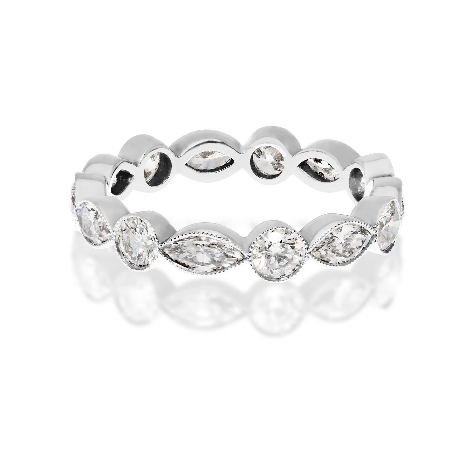 This handmade Platinum diamond eternity band is a stunning piece of jewelry that exudes luxury and sophistication. Set with alternating marquise and round cut diamonds in bezels, the design is both elegant and timeless.

With a ring width of 3.7mm