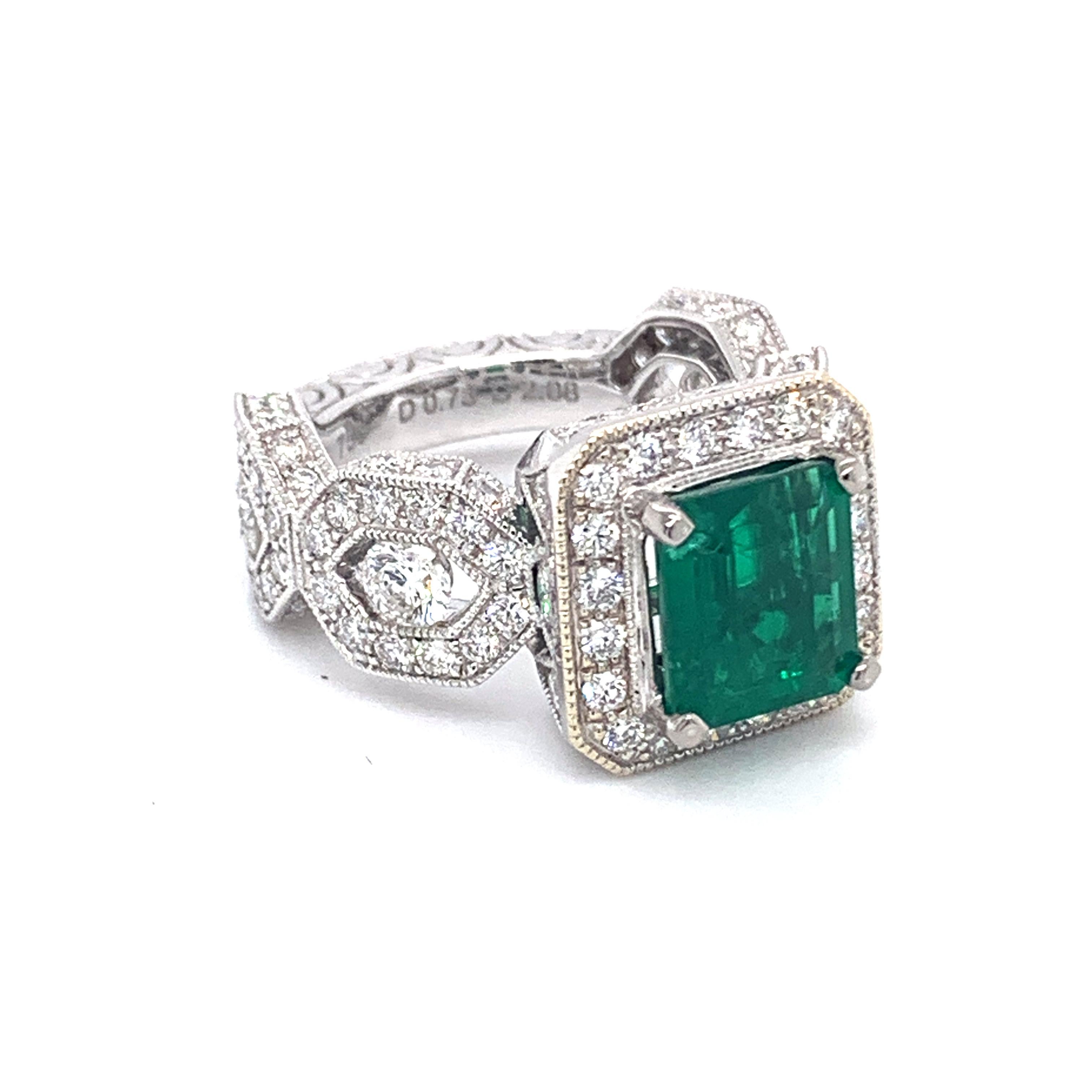 Stunning solid Platinum 2.40 carat emerald engagement ring set with pave style diamonds 2.80 carat in weight FG color VS1 clarity