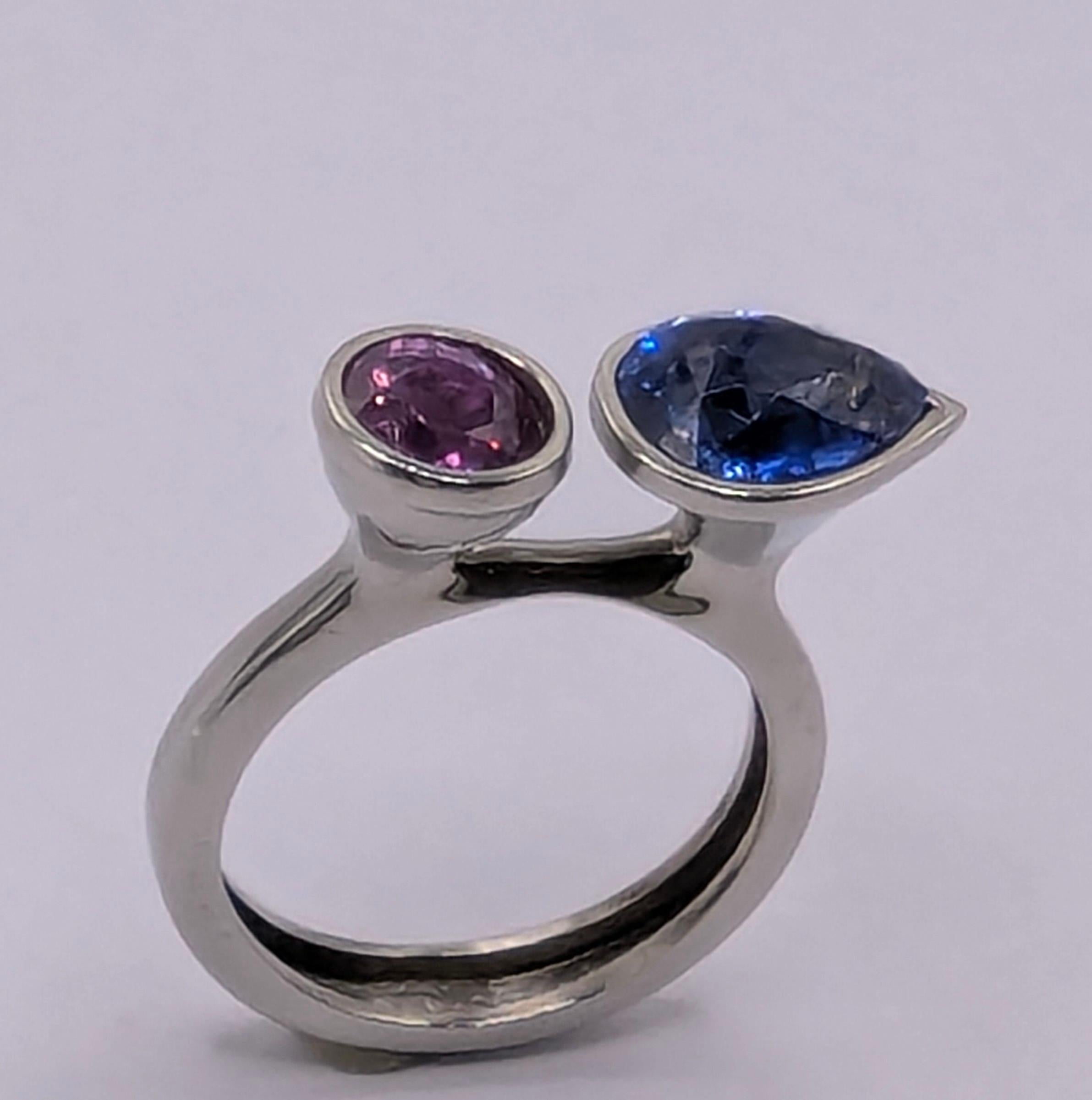 Tiffany Designer, Thomas Kurilla begins a new sculpture gemstone ring series. A modern organic platinum 2.43 Carat Blue Sapphire 1.08 Carat Lavender Sapphire Ring. A fun shaped shank and excellent gems to compliment each other in this 2 stone ring.