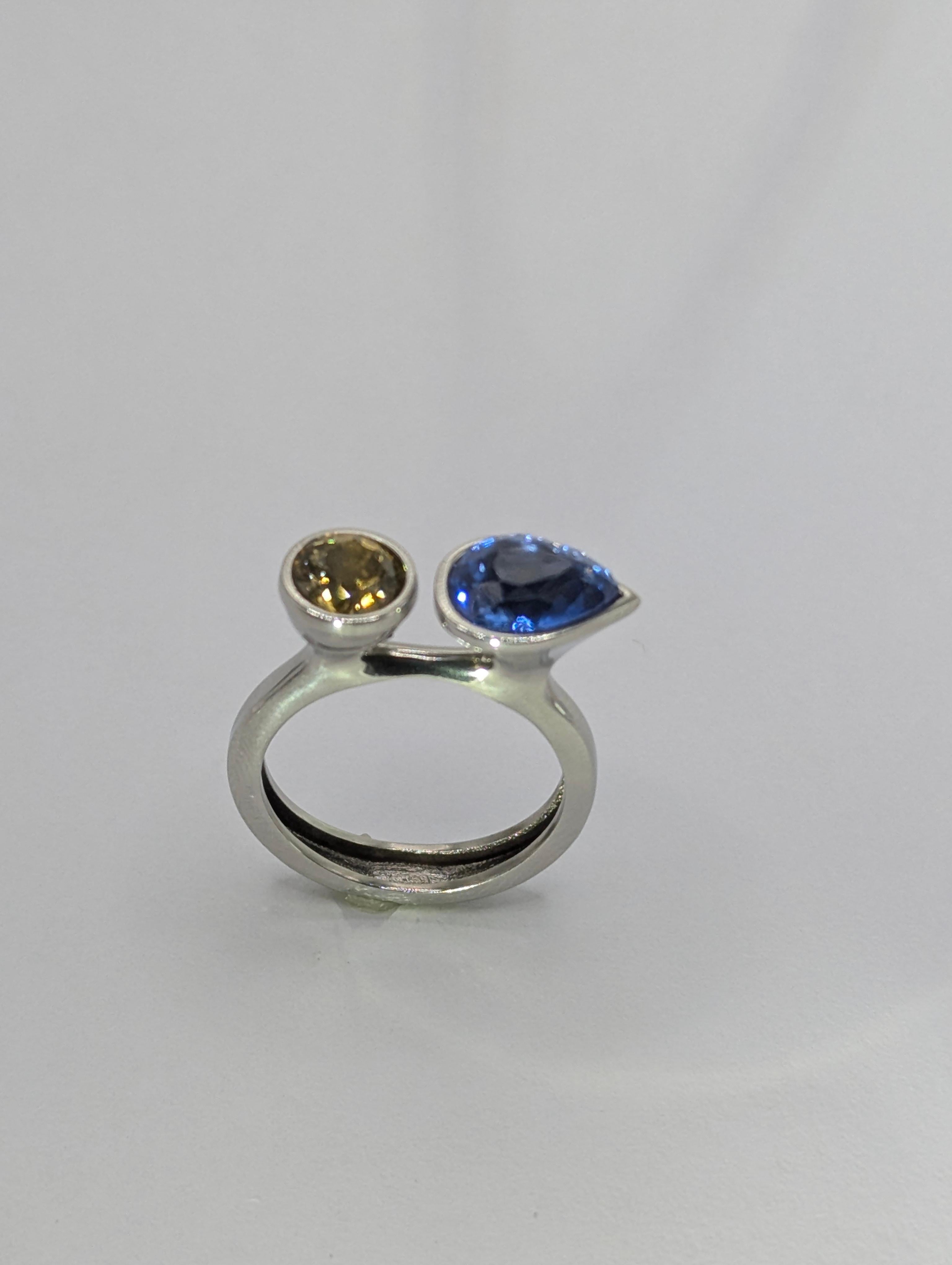 For Sale:  Platinum 2.43 Carat Blue Sapphire and 1.06 Carat Yellow Sapphire Sculpture Ring 5