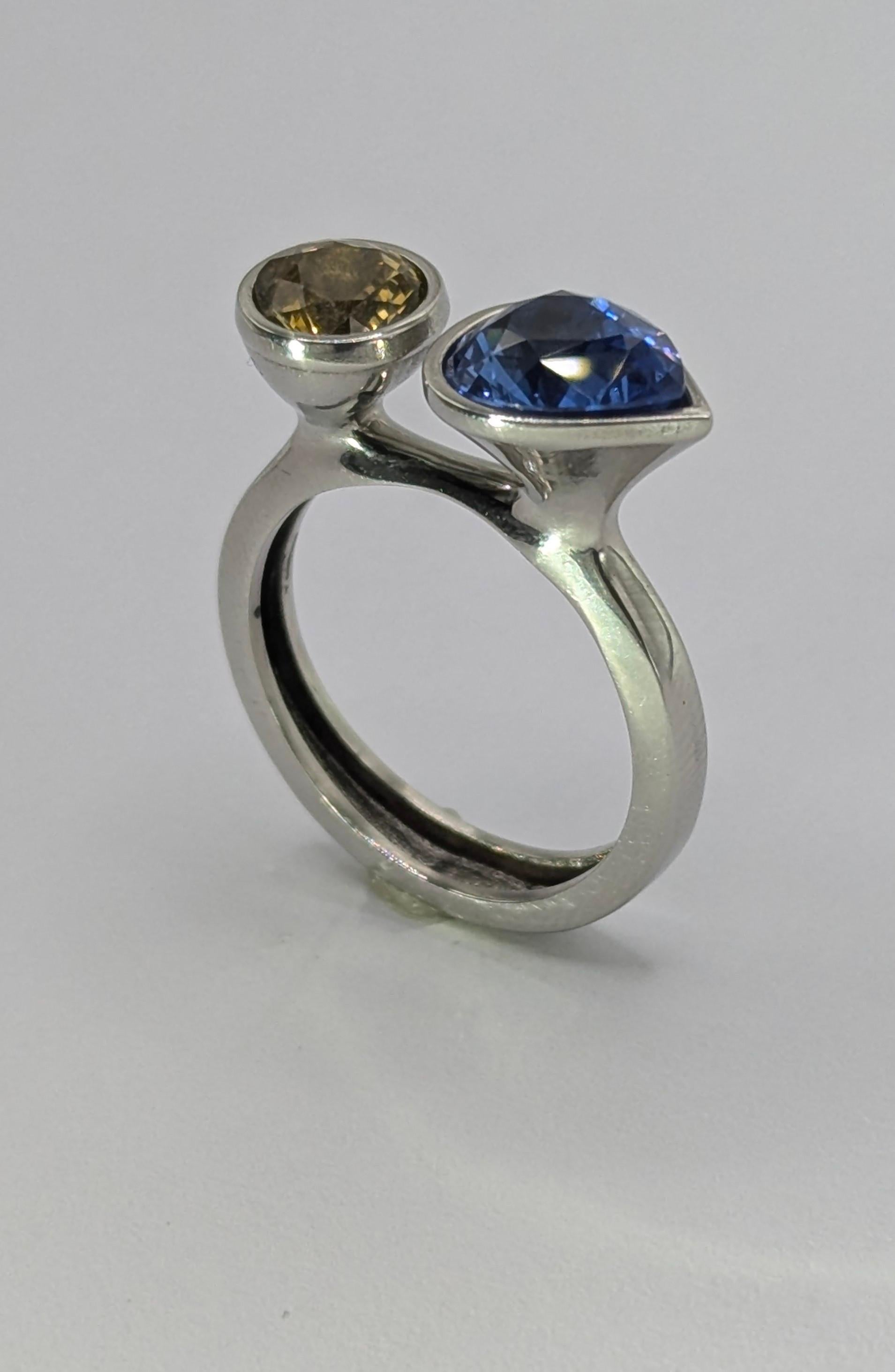For Sale:  Platinum 2.43 Carat Blue Sapphire and 1.06 Carat Yellow Sapphire Sculpture Ring 7