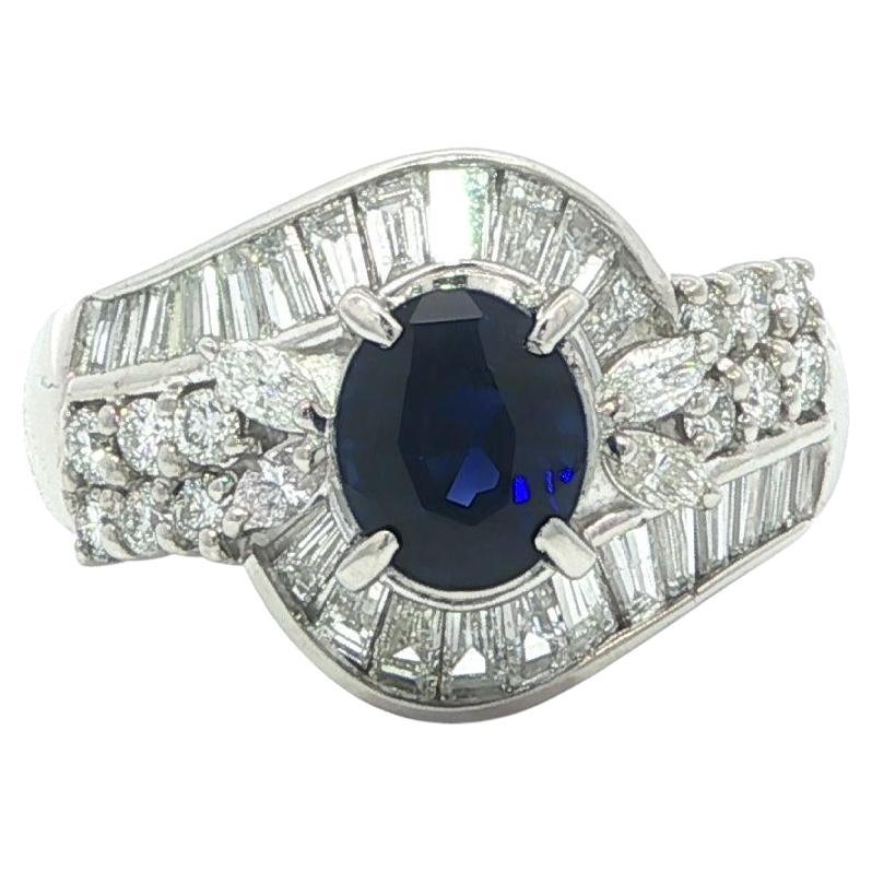 Platinum 2.45ctw Oval Blue Sapphire w/ Baguette Marquise 
Round Diamond Ring For Sale