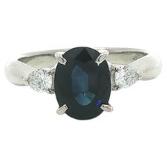 Platinum 2.57ctw Oval Deep Blue Sapphire w/ Pear Diamonds Sides Ring