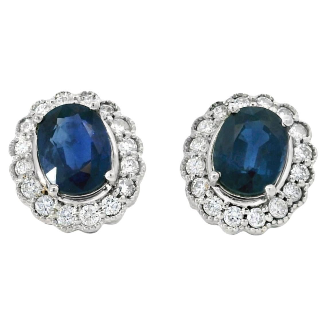 Platinum 2.64ct Sapphires and 0.57ct Round Brilliant Diamond Earrings