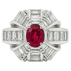 Platinum 2.67ctw Oval Mozambique Vivid Red Ruby w/ Baguette Diamond Ring