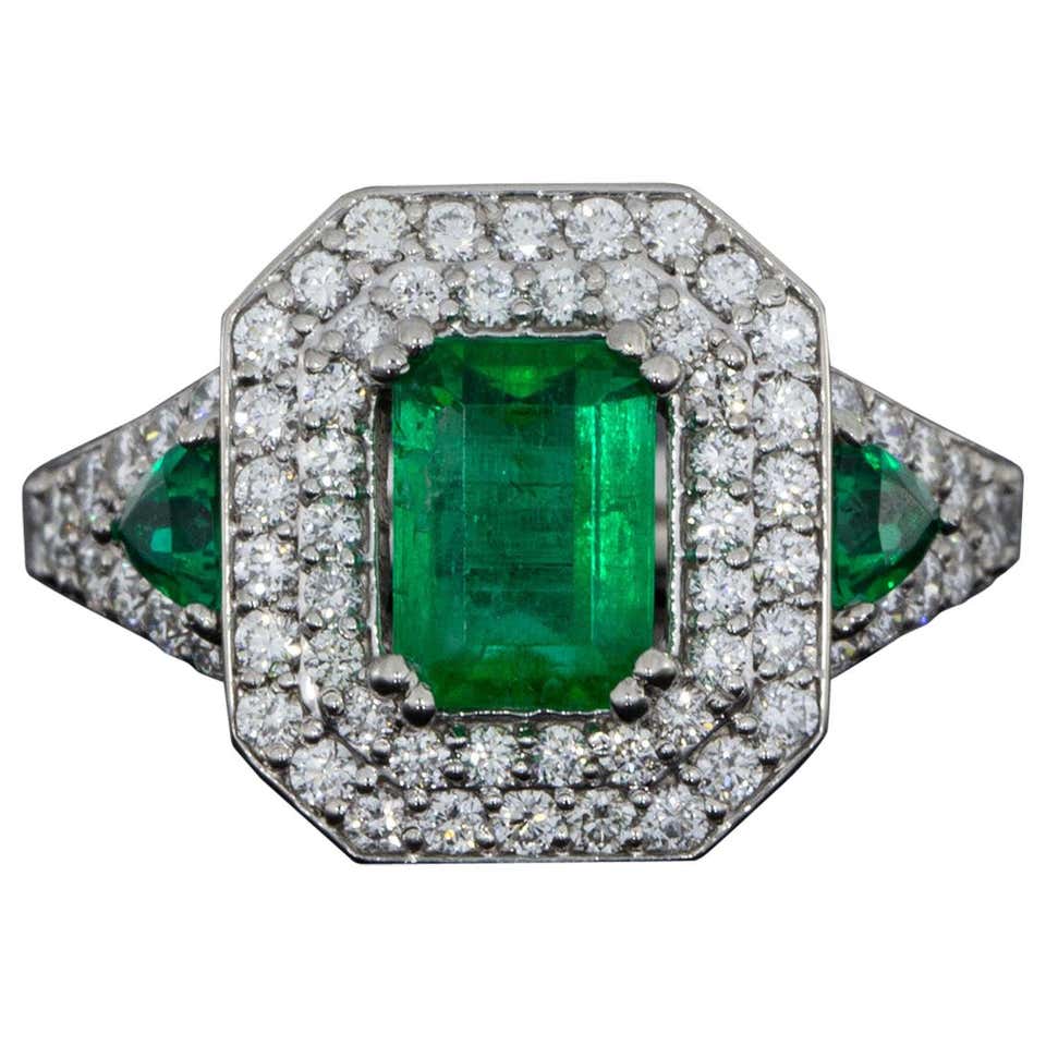 Emerald and Baguette cut diamond gold Halo Ring at 1stDibs