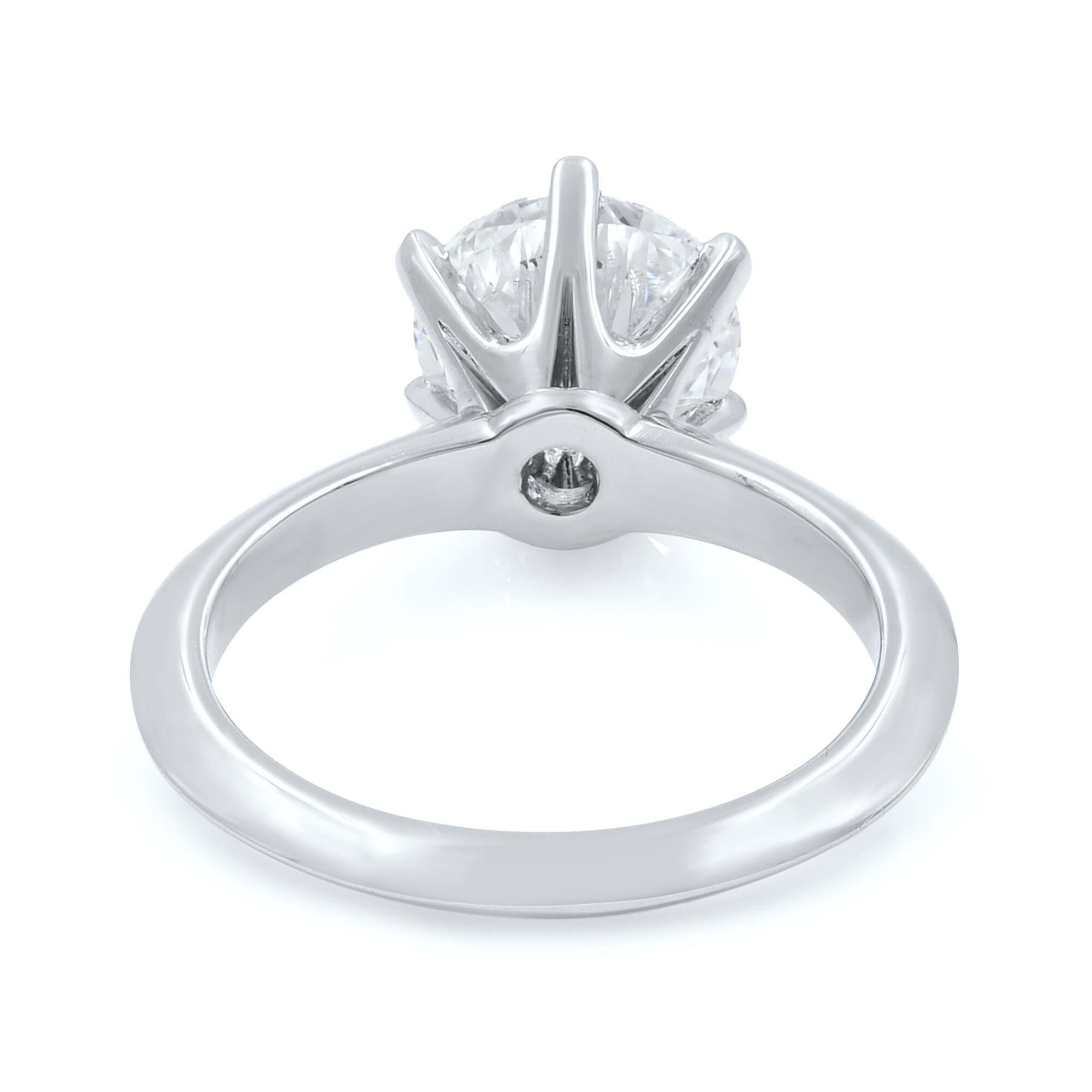 solitaire round cut engagement rings