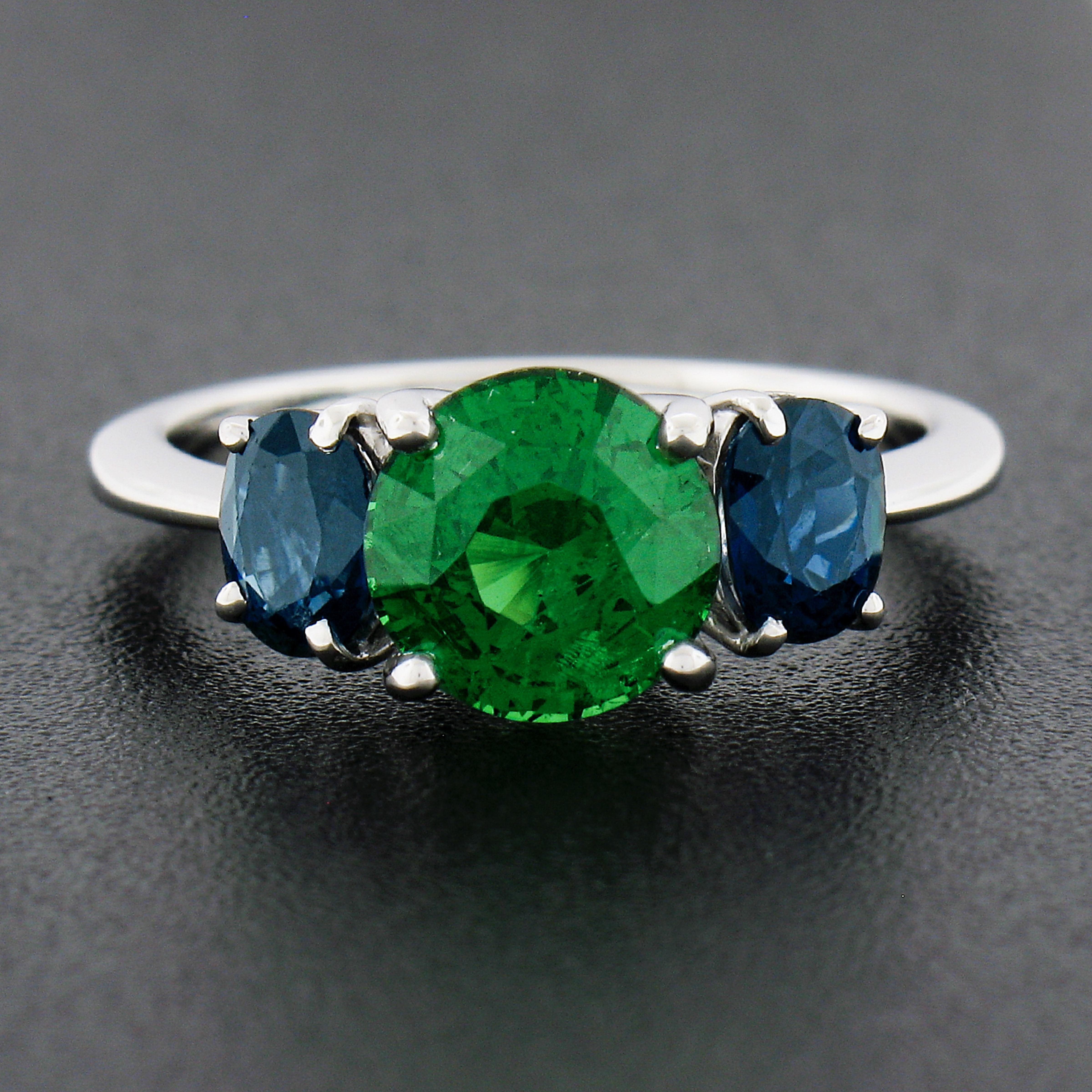 gold ring with green stone