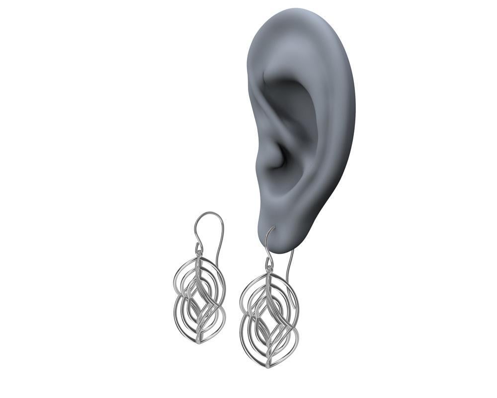 Le designer de Tiffany, Thomas Kurilla, a créé ces boucles d'oreilles en forme de losange en platine 3.  Je ne peux pas m'arrêter avec cette forme de losange. C'est mon  forme préférée. Je l'ai utilisé tout au long de ma carrière. Une forme