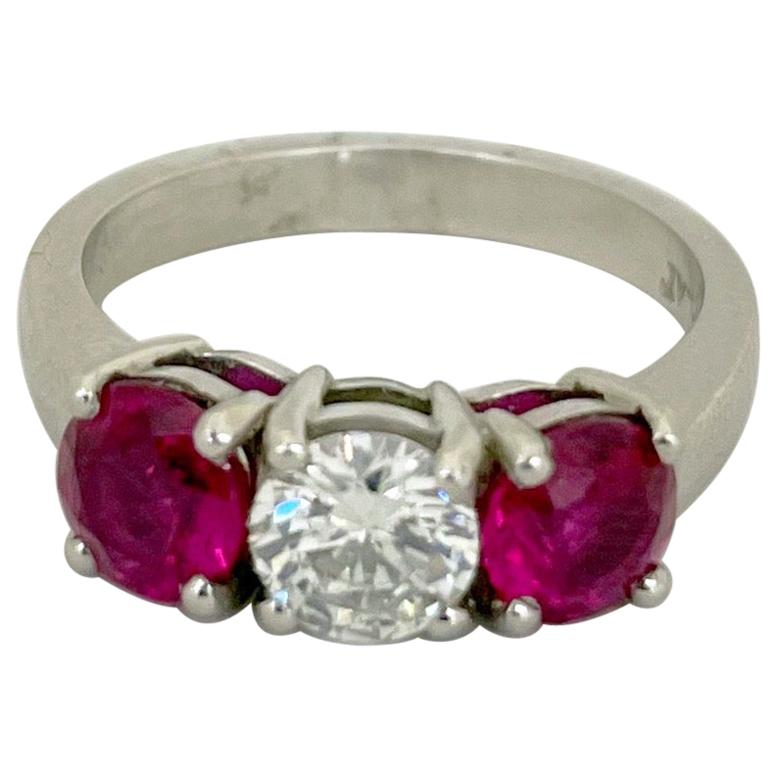 Platinum 3 Stone, 1.63 Carat Ruby and .61 Carat Diamond Ring For Sale