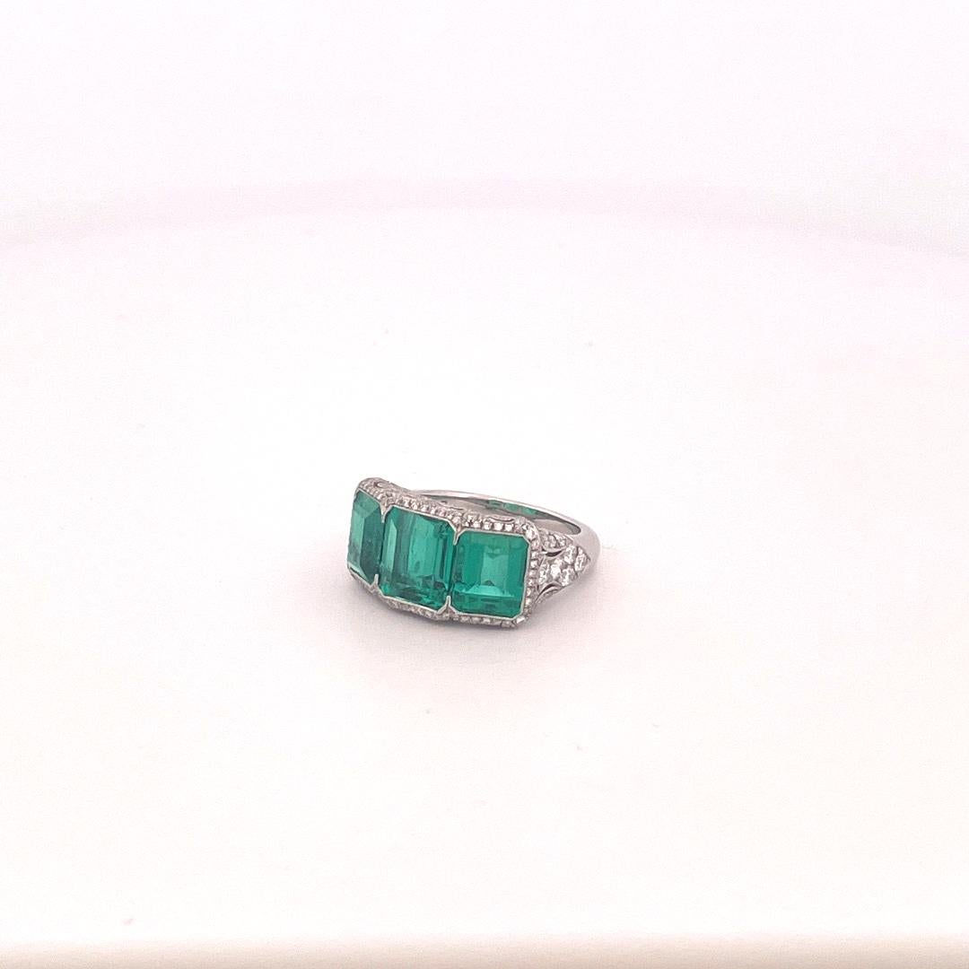 Platinum 3 Stone Colombian Emerald & Diamond Ring For Sale 4