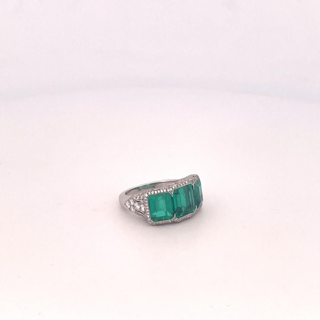 Emerald Cut Platinum 3 Stone Colombian Emerald & Diamond Ring For Sale