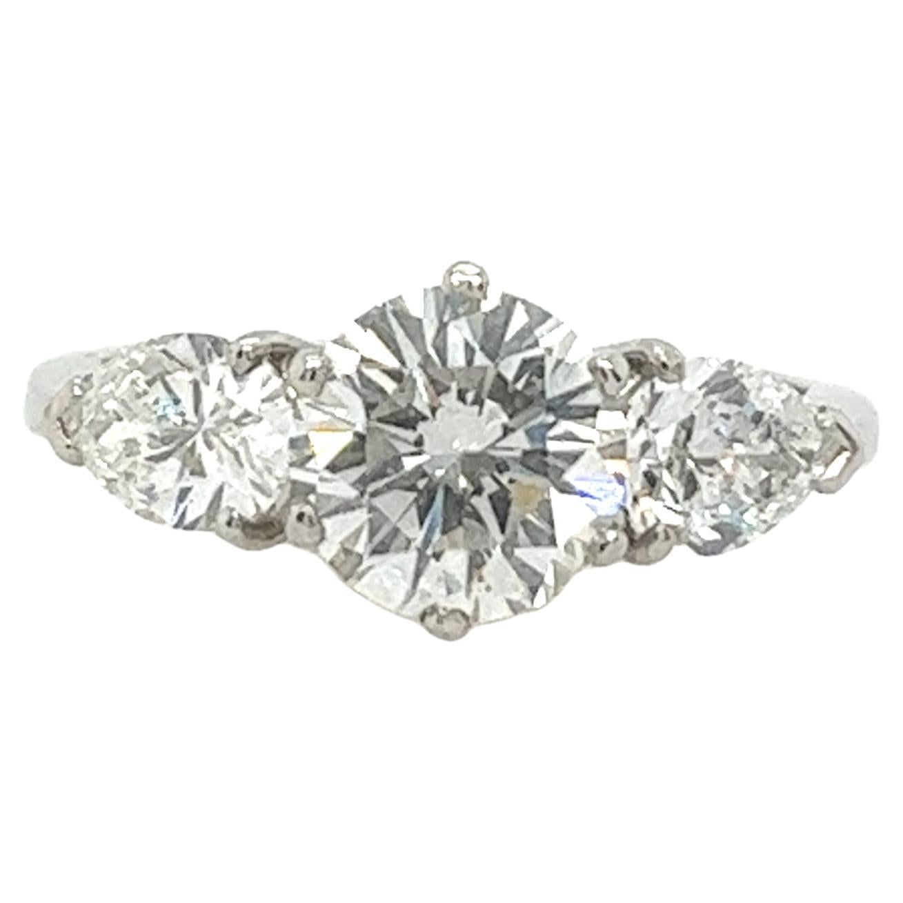 Platinum 3-Stone Diamond Ring Set With 1.29ct&0.85ct Round & Pear Shape Diamonds