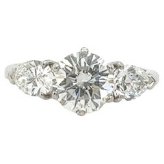 Platinum 3-Stone Diamond Ring Set With 1.29ct&0.85ct Round & Pear Shape Diamonds