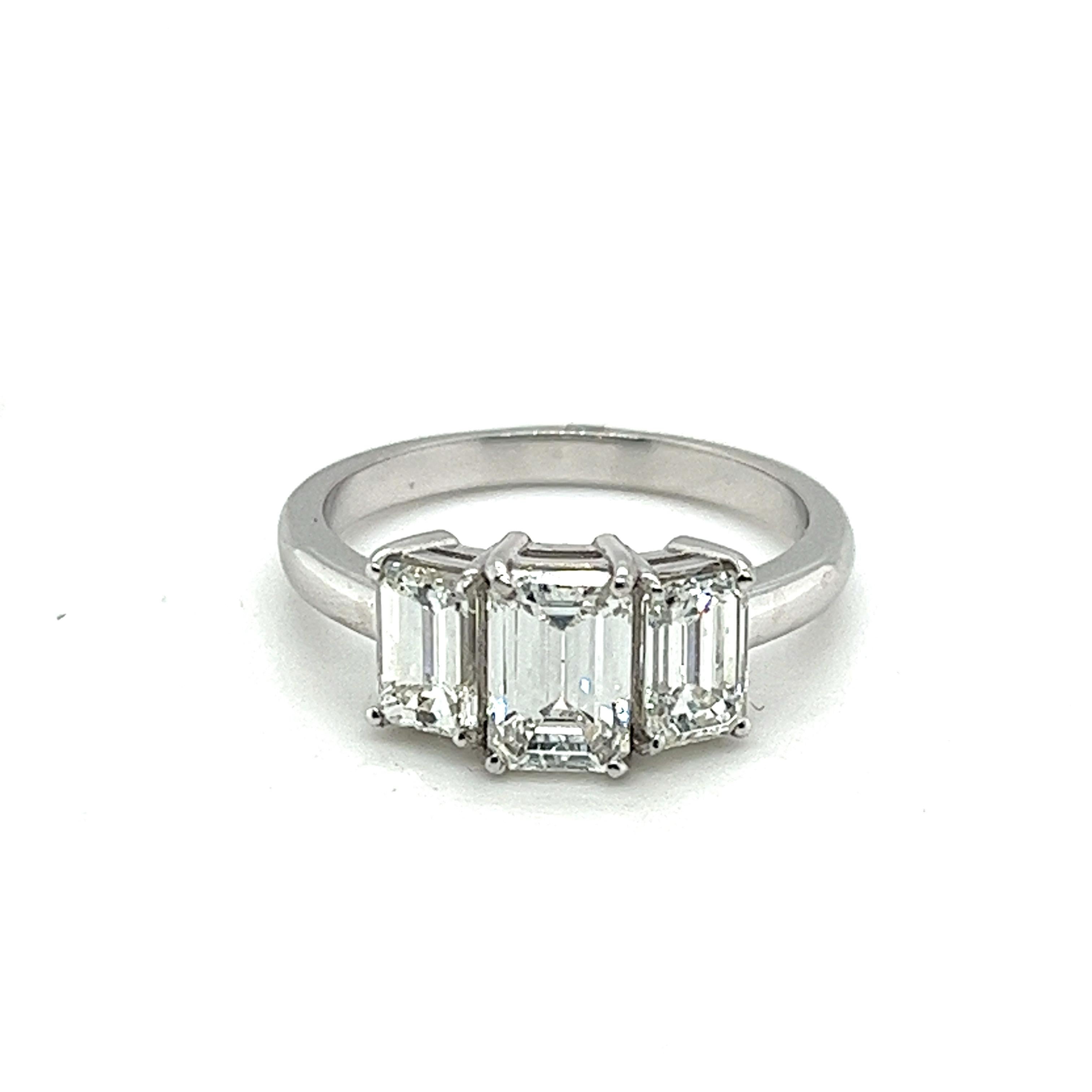 Platinum 3 Stone Emerald Cut 2.25 Carats Diamonds Ring For Sale 1