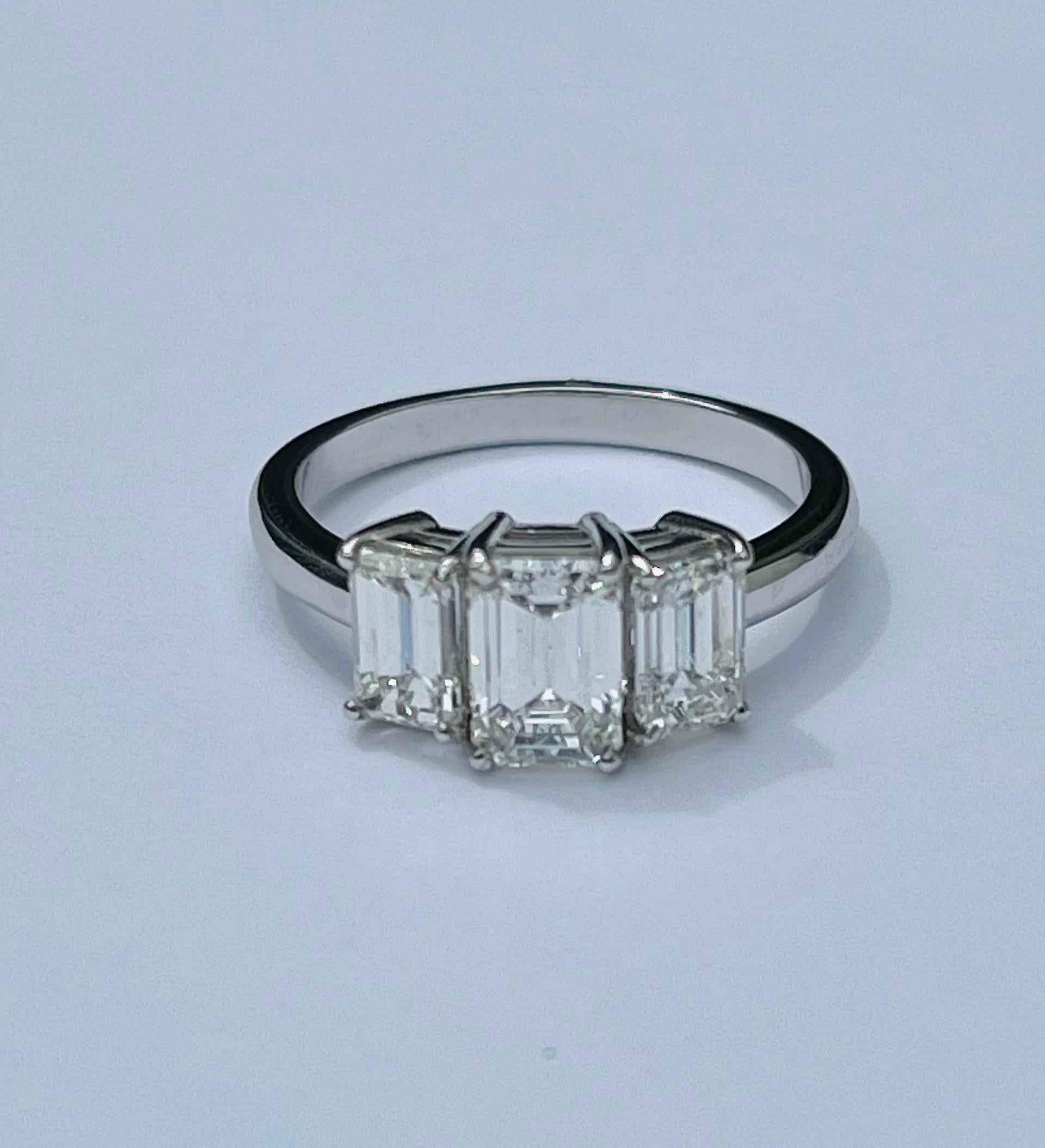 Platinum 3 Stone Emerald Cut 2.25 Carats Diamonds Ring For Sale 2