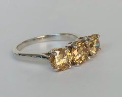 Platinum 3-Stone Natural Champagne Diamond 2.56 Carat Ring