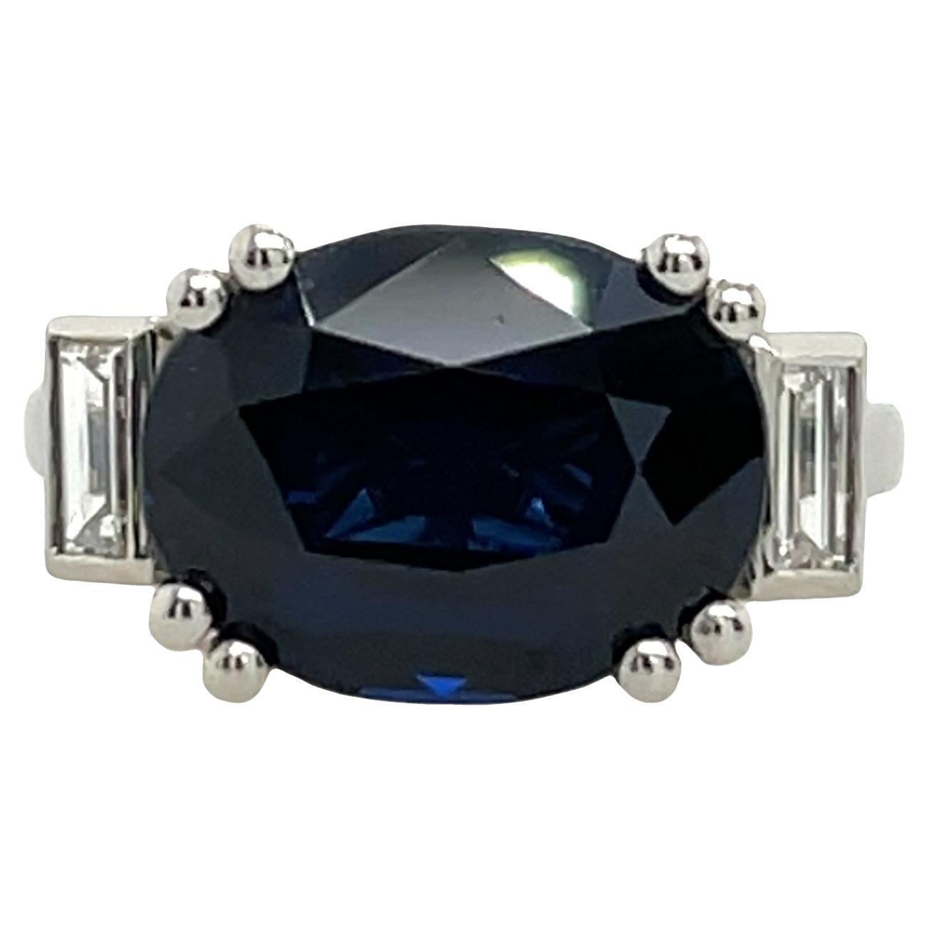 Platinum 3-Stone Ring – 7.56ct Oval Sapphire with Diamond Accents en vente
