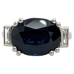 Platinum 3-Stone Ring – 7.56ct Oval Sapphire with Diamond Accents