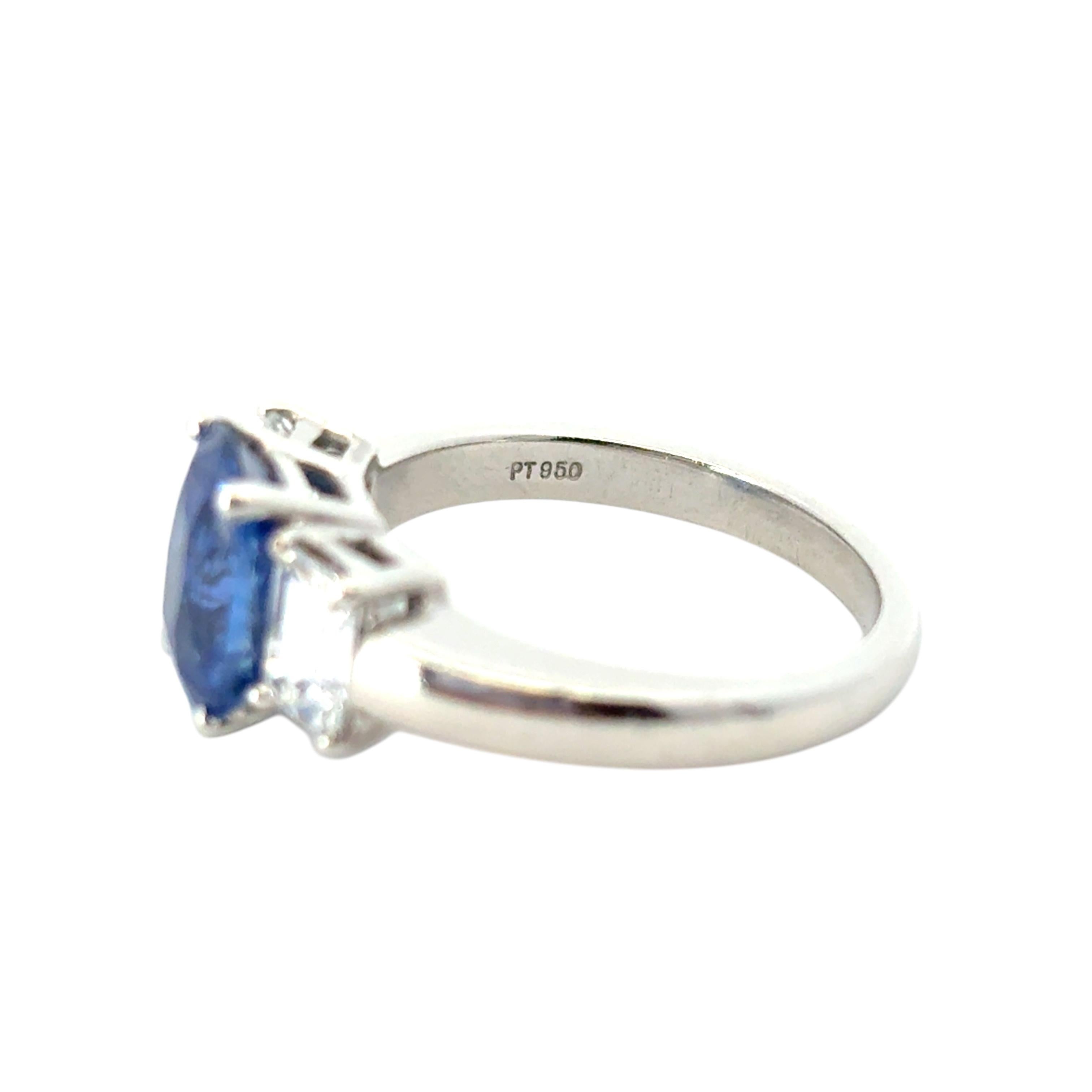 Platinum 3 Stone Ring set with Natural Cushion Blue Sapphire and Side Diamonds For Sale 6