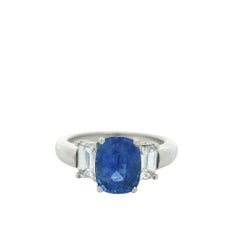 Platinum 3 Stone Ring set with Natural Cushion Blue Sapphire and Side Diamonds