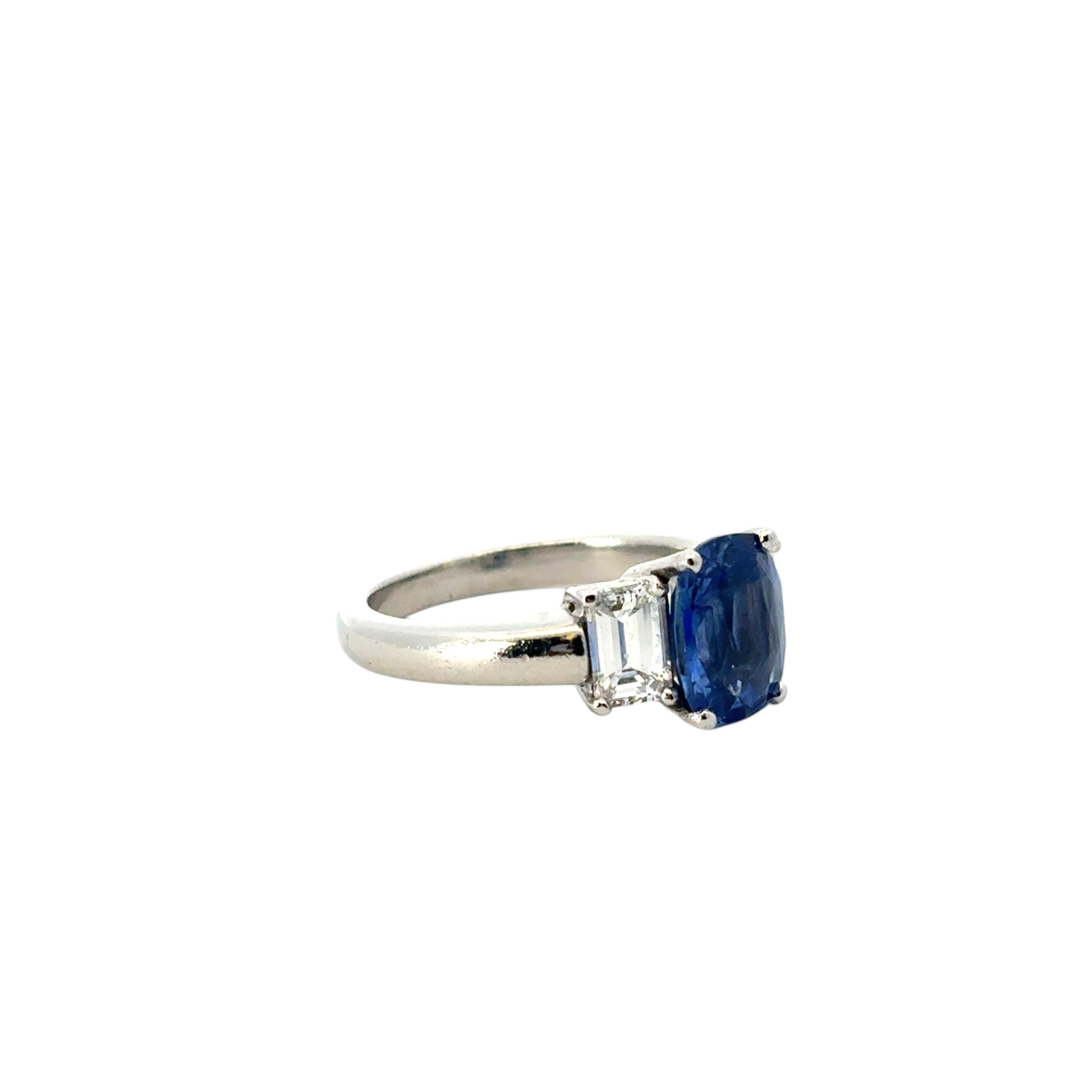 Oval Cut Platinum 3 Stone Ring set with Natural Cushion Blue Sapphire and Side Diamonds For Sale
