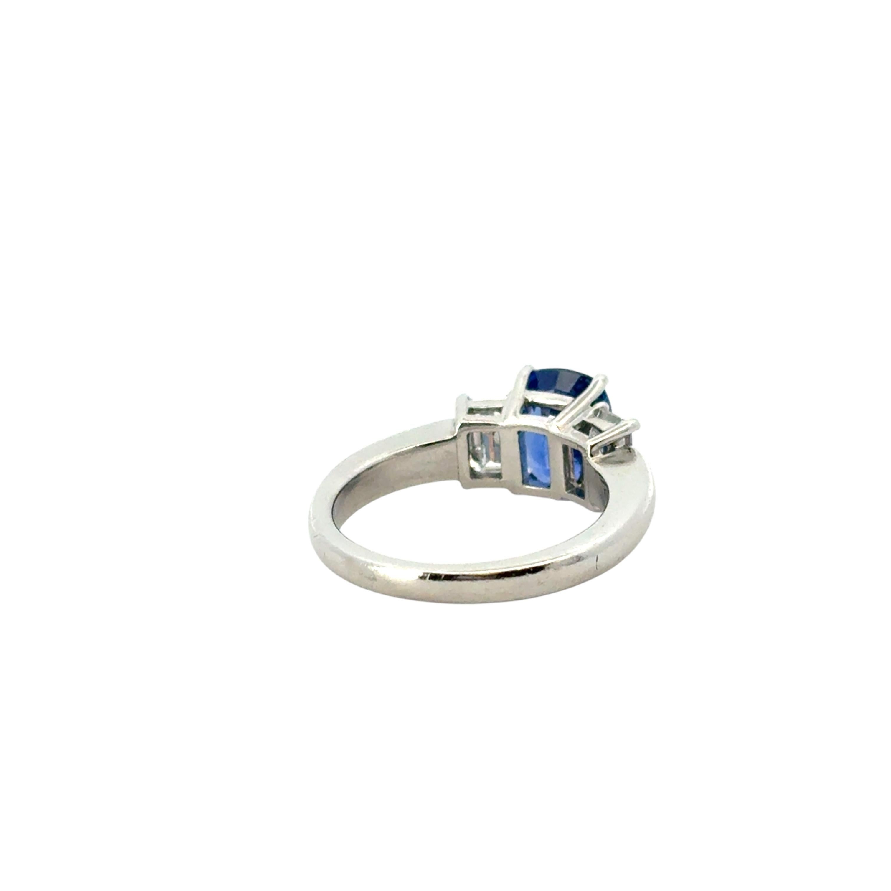 Platinum 3 Stone Ring set with Natural Cushion Blue Sapphire and Side Diamonds For Sale 1