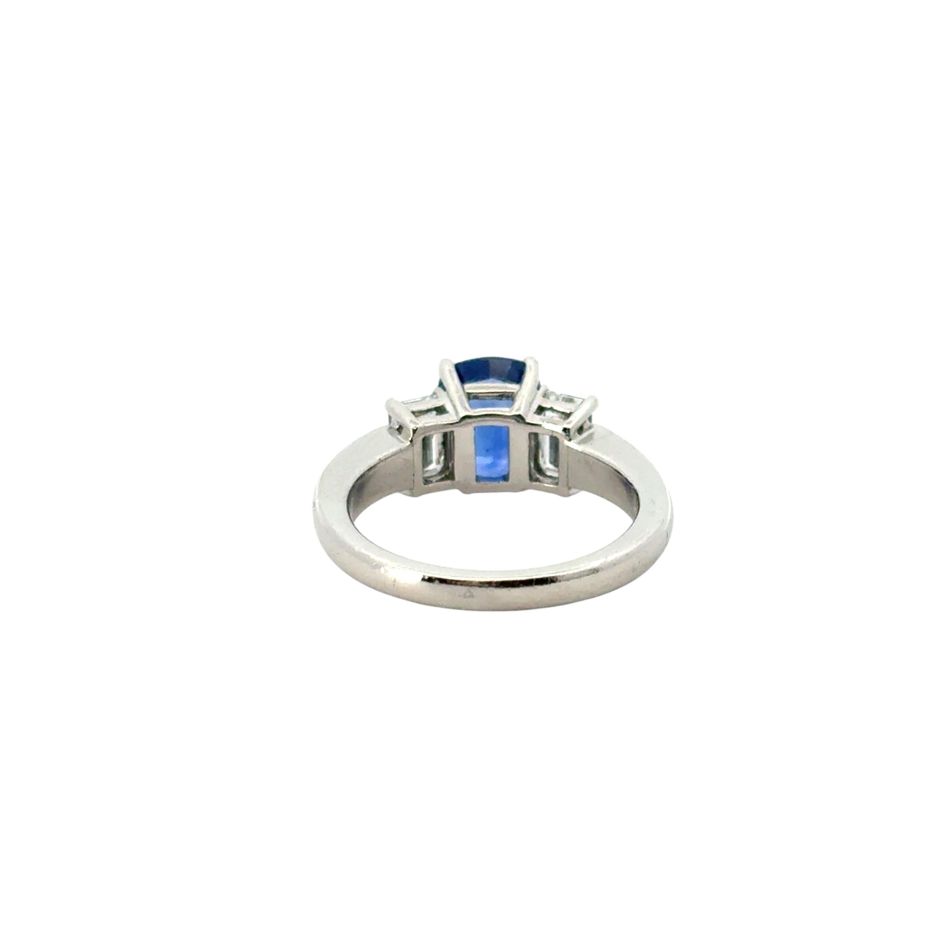 Platinum 3 Stone Ring set with Natural Cushion Blue Sapphire and Side Diamonds For Sale 2