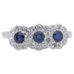 Bague en platine à 3 pierres avec saphir naturel de 0,5 carat et diamants NGI Cert