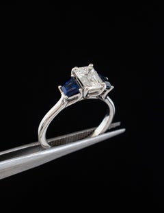 Platinum 3 Stone Ring with Emerald Cut Diamond and Trapezoid Sapphires