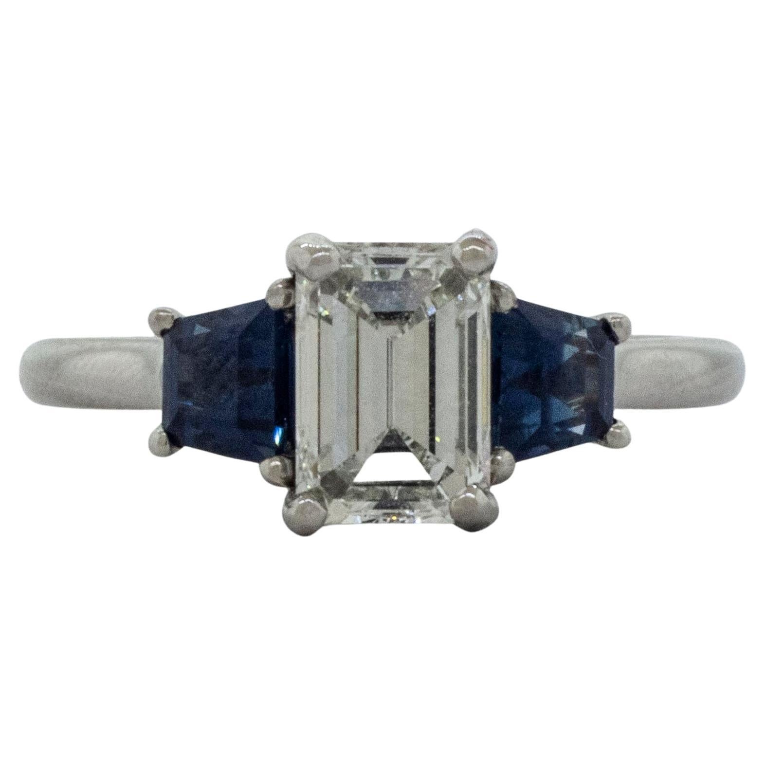 Platinum 3 Stone Ring with Emerald Cut Diamond and Trapezoid Sapphires