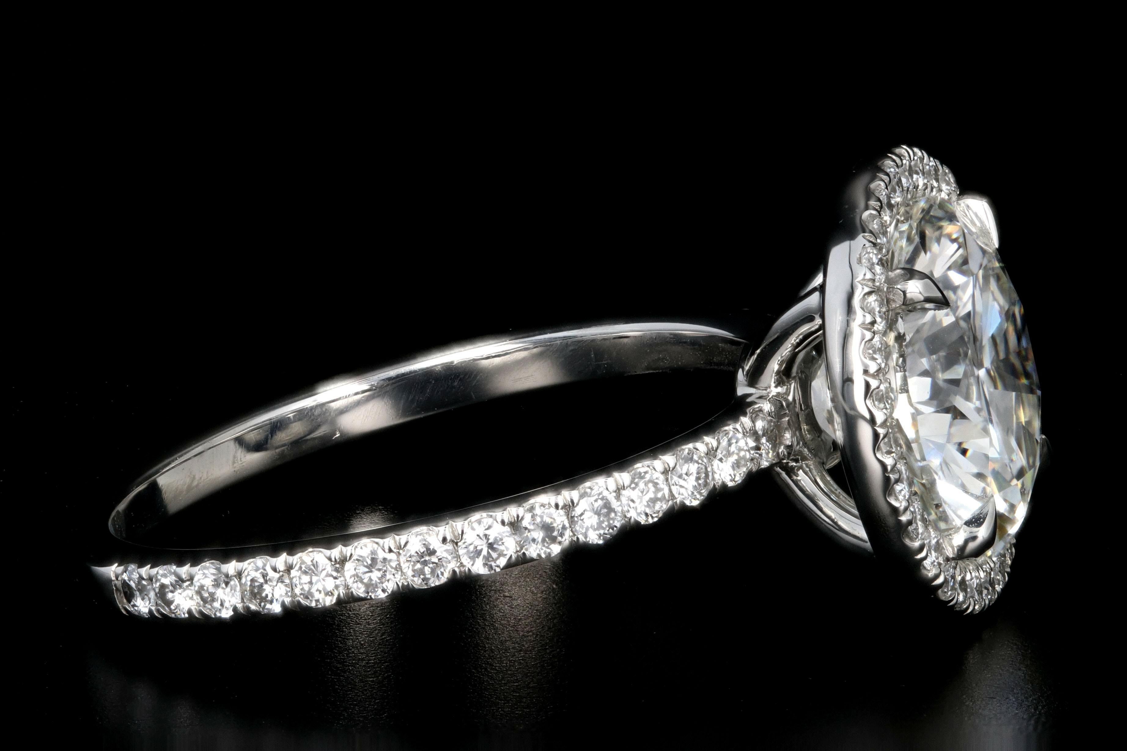 Round Cut Platinum 3.01 Carat Round Brilliant Cut Diamond Halo Engagement Ring