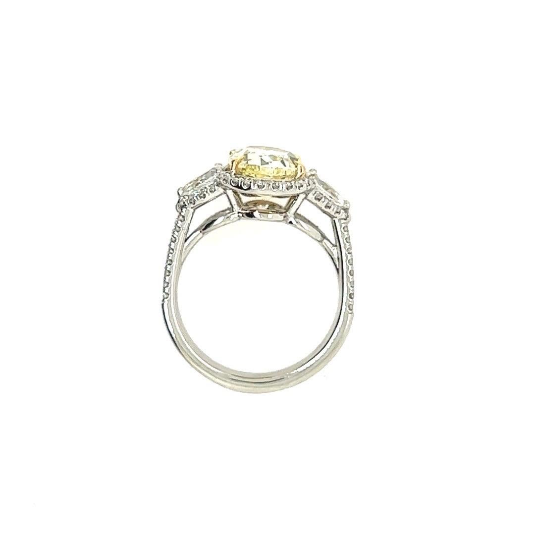 Oval Cut Platinum 3.16ct Oval GIA Certified Natural Yellow VVS Diamond Engagement Ring For Sale