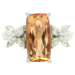 Bague longue coussin de 3,26 ctw avec topaze orange marquise sur les côtés et diamants