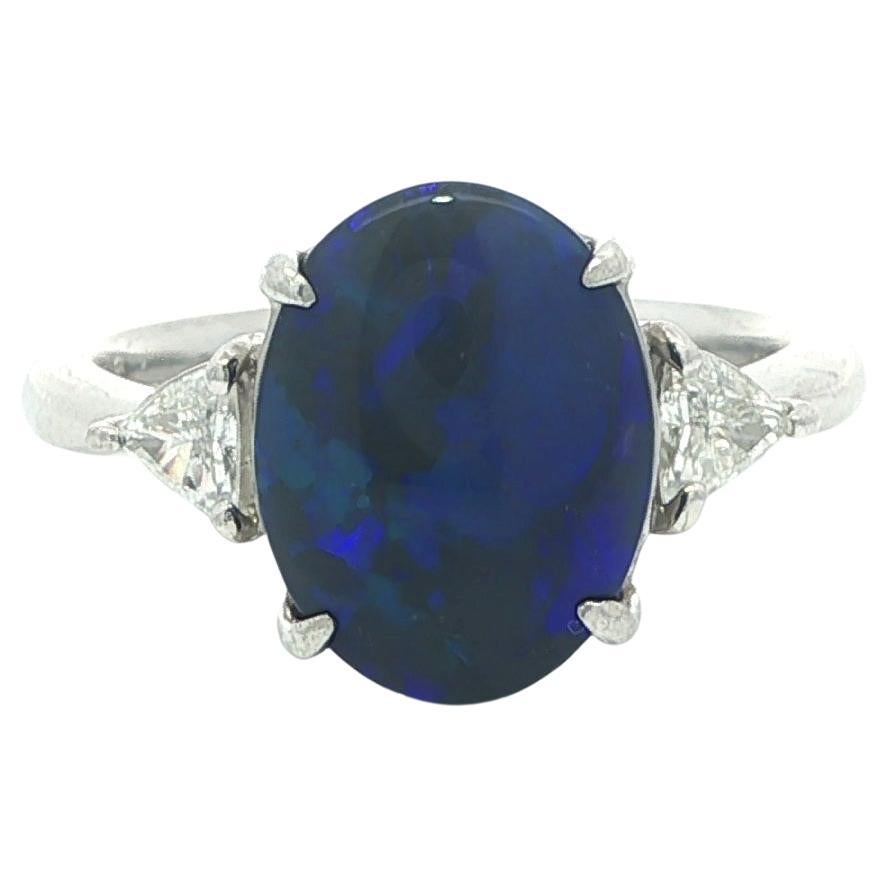 Platinum 3.47ctw Black Blue 
Green Play Opal w/ Trillion Diamond Sides Ring For Sale