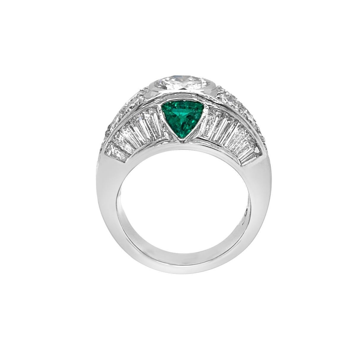 Metal: Platinum
Ring Size: 5.5
Gemstone: Emerald, Diamond
Center Diamond Weight: 1.53 CT
Side Diamond Weight: 1.95 CT
Emerald Weight: 0.70 CT
GIA Certified Center Stone : Color Grade- E
Clarity: VS1
CSR1390