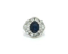Platinum 3.48ctw Large Oval Sapphire w/ Round & Baguette Diamond Flared Ring