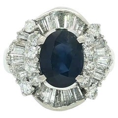 Platinum 3.48ctw Large Oval Sapphire w/ Round & Baguette Diamond Flared Ring