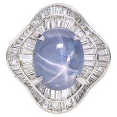 Zaffiro a stella in platino da 3,50 carati e diamante Baguette Halo