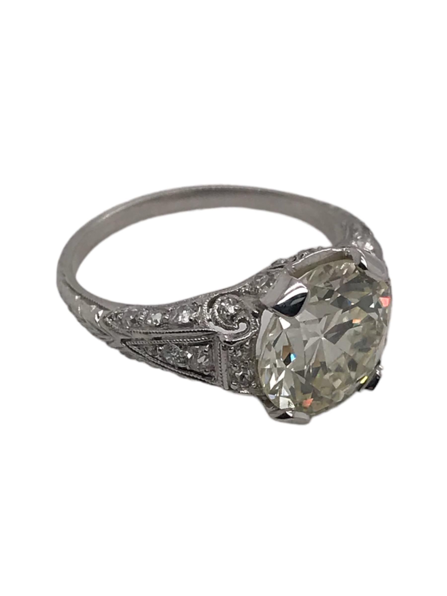 Some pieces words just can't describe!
This magnificent beauty was crafted in the Edwardian Era, known for the use of scroll work in designs from this period.
The ring features 38 stunning old single cut diamonds & excellent engraving