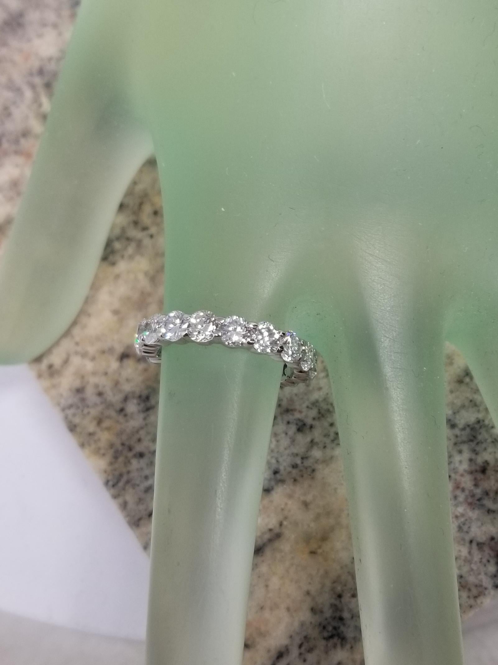 Round Cut Platinum 3.65 Carats Diamond Eternity Ring Set with Shared Prongs For Sale