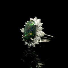 Platinum 3.65ctw GIA Elongated Oval Black Opal w/ Diamond Halo Nice Shape Ring
